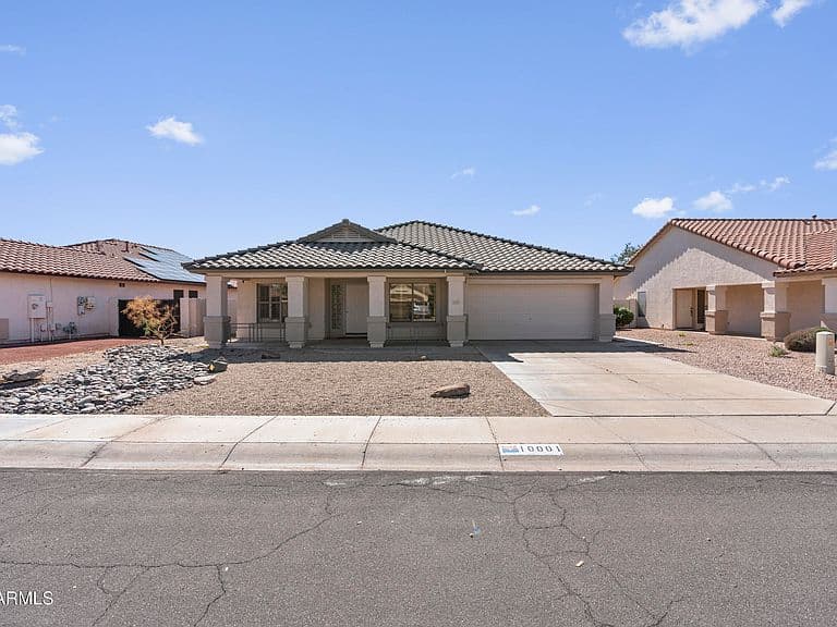 10001 W POTTER Drive photo 1