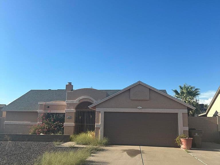 7110 W LAUREL Lane photo 1