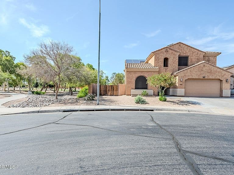 6922 S BLACK HILLS Way photo 3