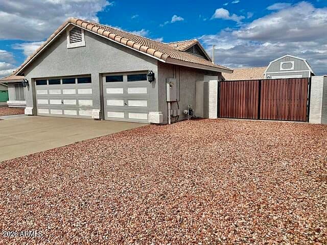 8836 W CHARTER OAK Road photo 2