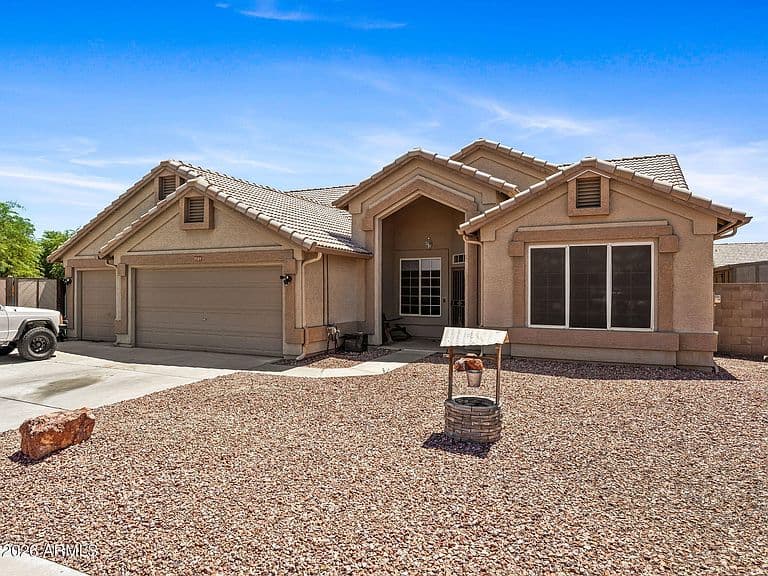 7727 W VOLTAIRE Avenue photo 1