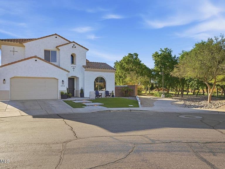 6932 S BLACK HILLS Way photo 1
