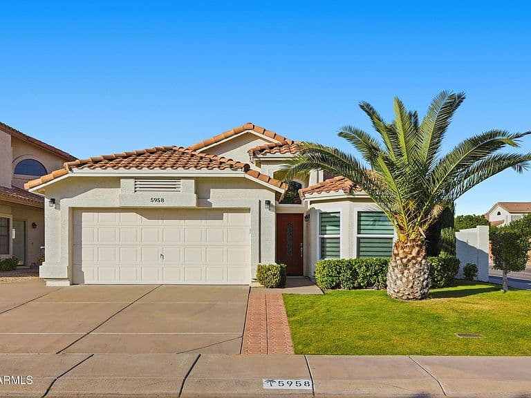 5958 E Kelton Ln photo 2