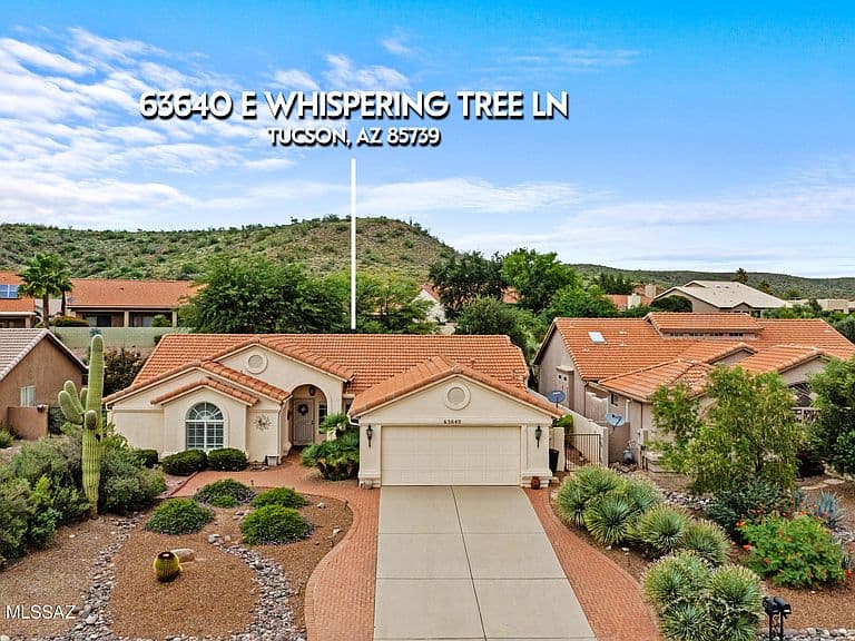 63640 E Whispering Tree Ln photo 1