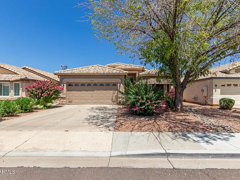 10268 W POTTER Drive photo 1
