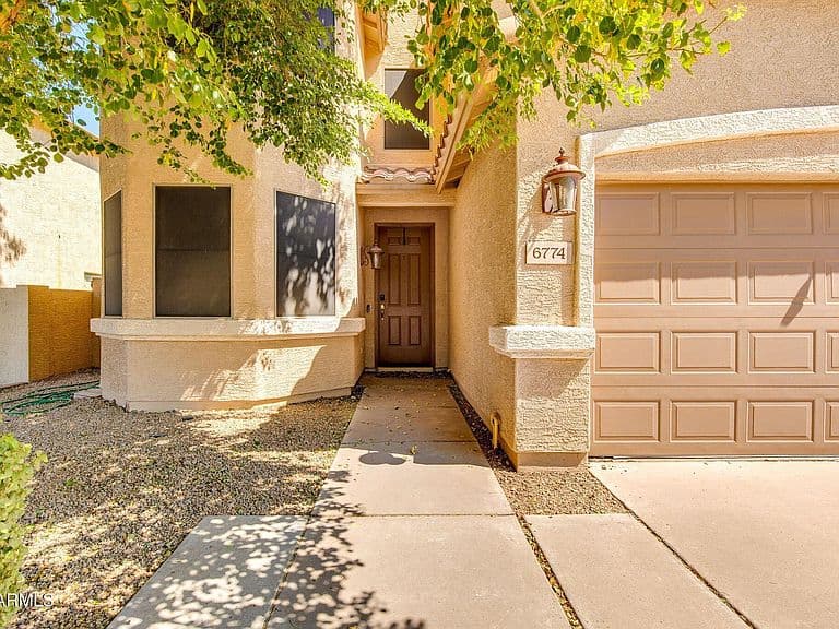 6774 W ROWEL Road photo 3