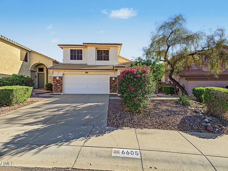 6605 W ROWEL Road photo 3