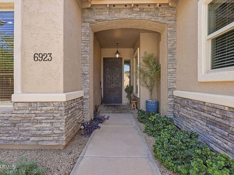 6923 S BLACK HILLS Way photo 2