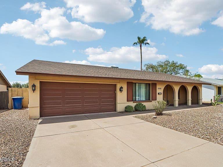 5502 S HAZELTON Lane photo 2
