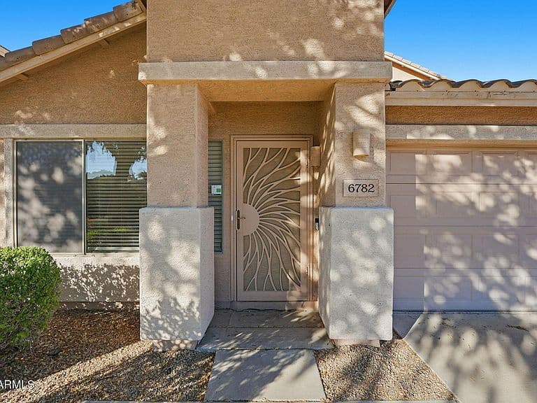 6782 W Rowel Rd photo 1