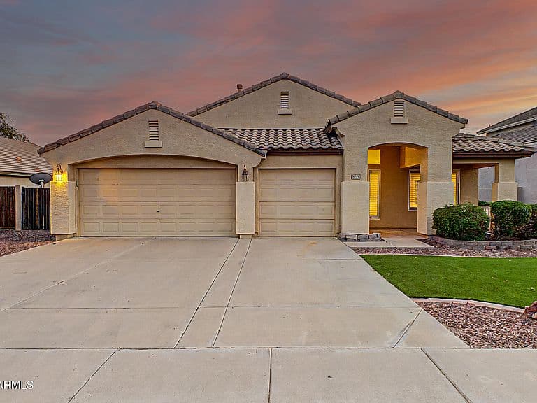 8239 W HARMONY Lane photo 1