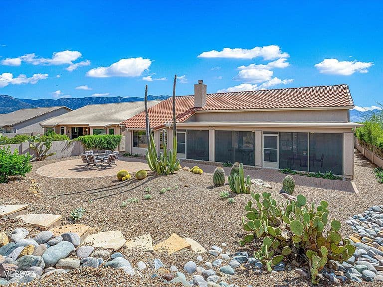 63140 E Whispering Tree Ln photo 1