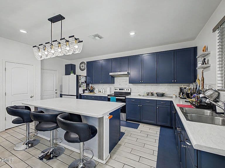 12333 W KALER Drive photo 4