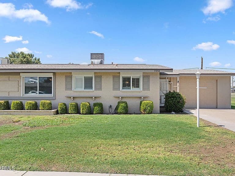 11034 N COGGINS Drive photo 1