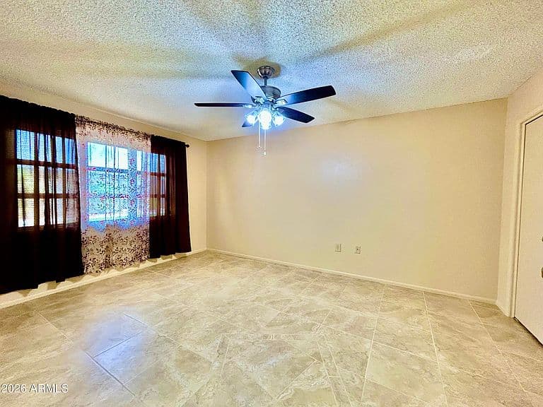 10878 W COGGINS Drive photo 2