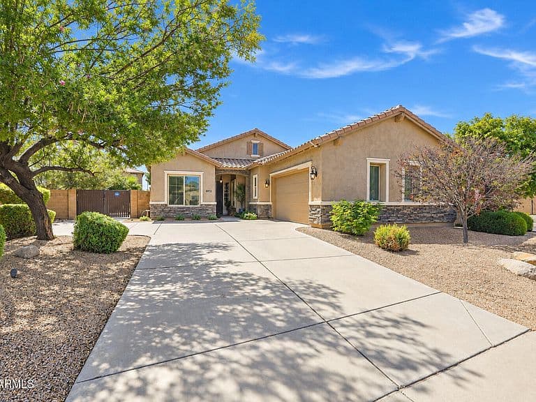 6923 S BLACK HILLS Way photo 1