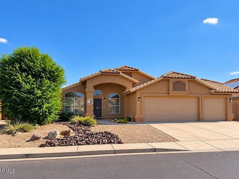 9559 W POTTER Drive photo 1
