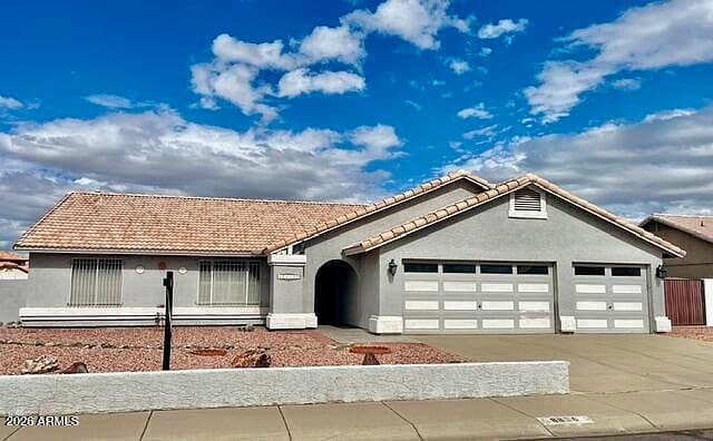 8836 W CHARTER OAK Road photo 1