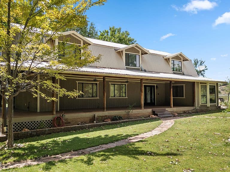 12070 W Kelton Ln photo 1