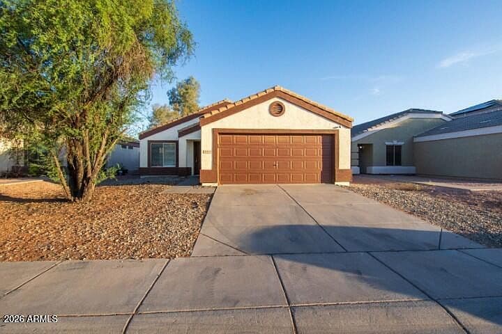 12325 W VALENTINE Avenue photo 1