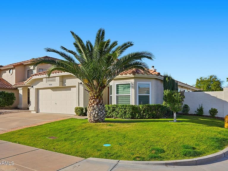 5958 E Kelton Ln photo 1