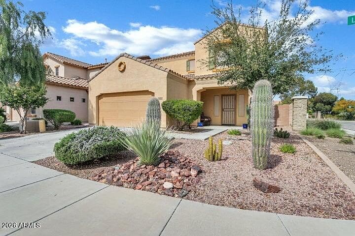 12022 W LEATHER Lane photo 1