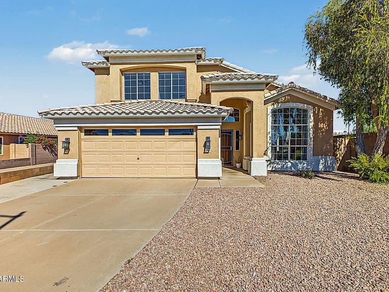 1002 W KELTON Lane photo 1