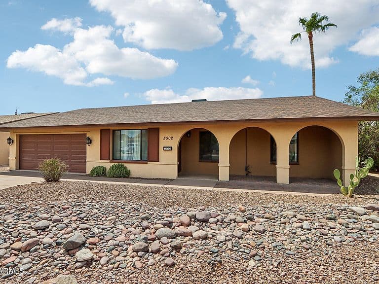 5502 S HAZELTON Lane photo 1