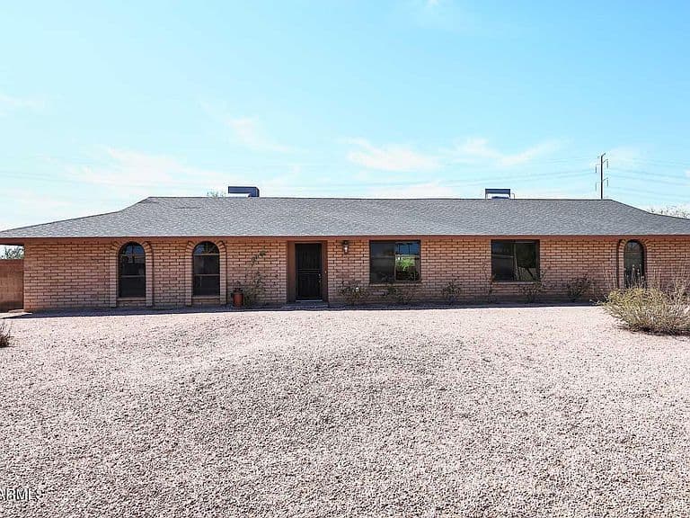 9821 E BECKER Lane photo 1
