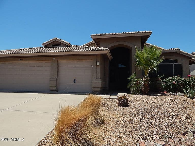 11424 S OBISPO Drive photo 1