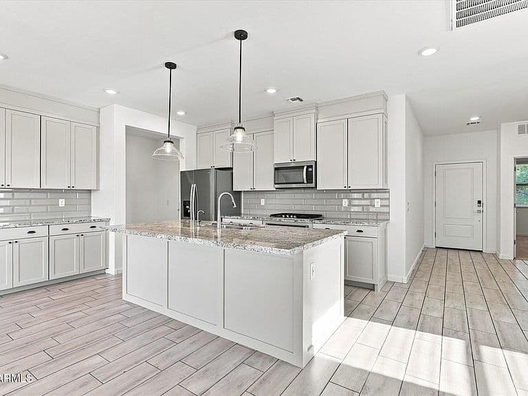 14031 W PERSHING Street photo 2